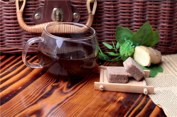 Gesundes festes Getränk-natürlicher Ingwer-Tee mit Brown-Zucker gut für Frau